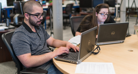 Students working on laptops