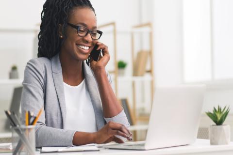 Woman on the phone and laptop