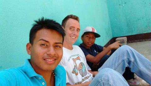 Student abroad posing for picture with others