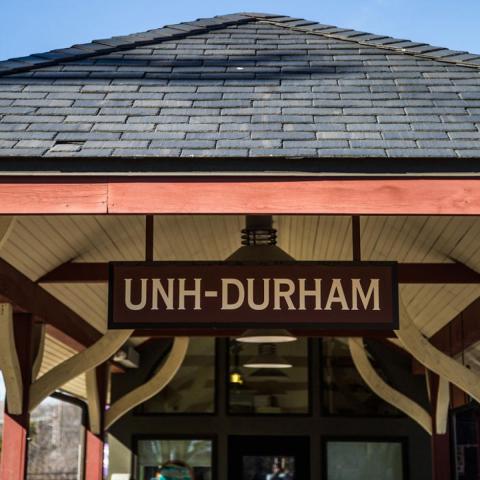 UNH-Durham sign at the Dairy Bar amtrak stop