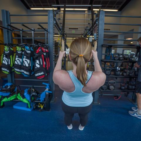 UNH student working out in Hamel Rec Center